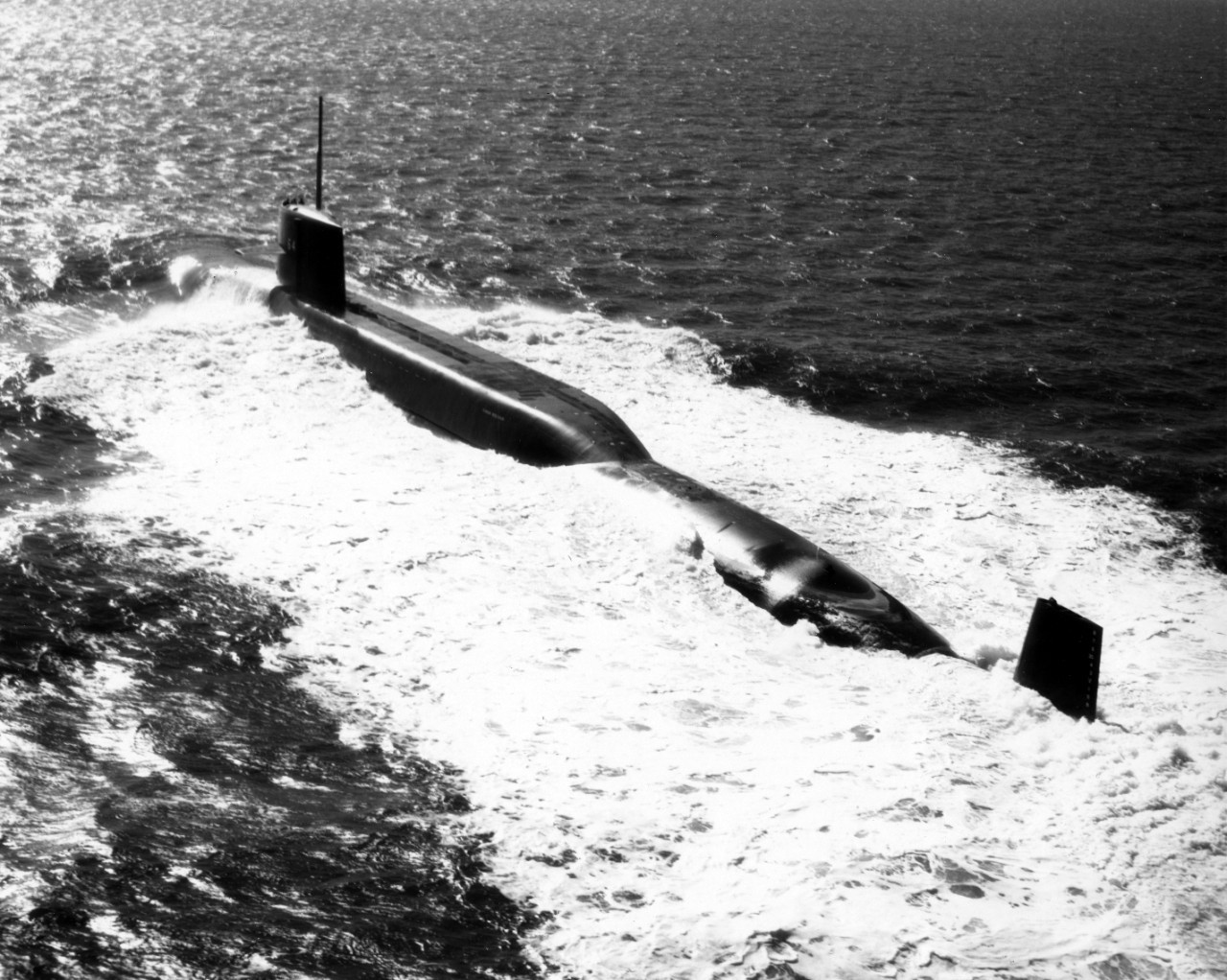 Photograph of USS Simon Bolivar (SSBN641) on the surface in the open ocean.